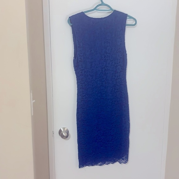 Brand new, tag still on dress. Large, lace material. Brand  unknown brand. - Picture 2 of 3